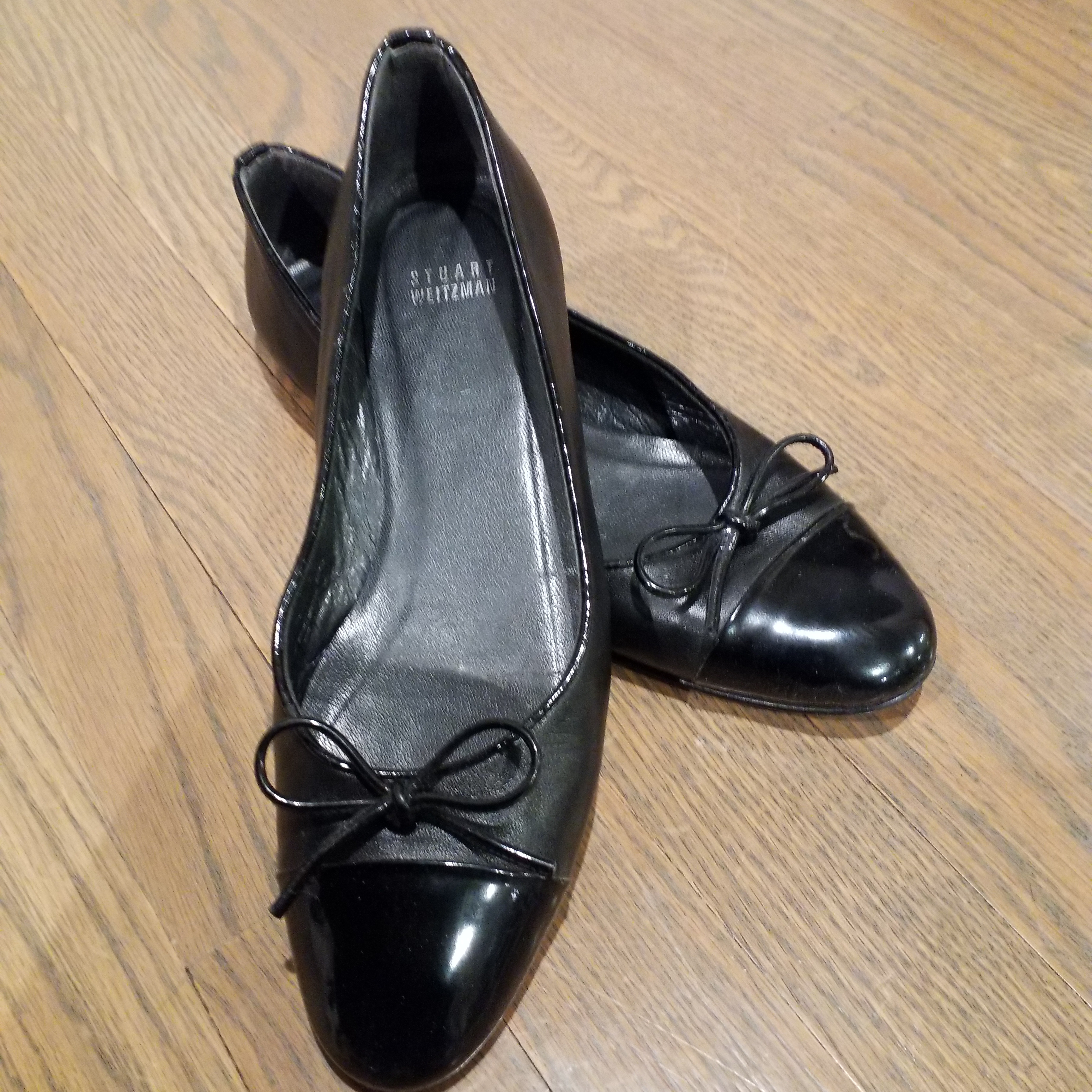 Stuart Weitzman Glossy Black Flats With Bow